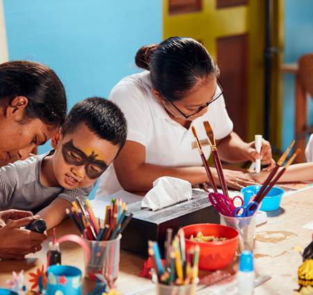 Kids painting at Kids Club at Sun Siyam Iru Fushi Maldives