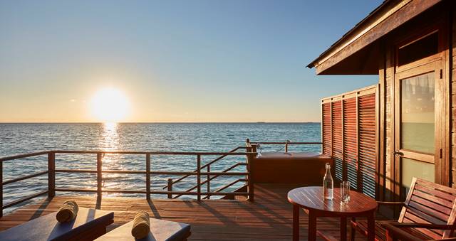 Sun Siyam Olhuveli Deluxe Water Villa Deck Sunset