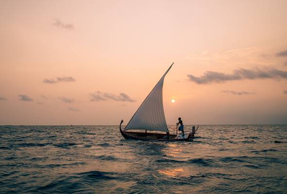 Sunset sailing at Vilu Reef