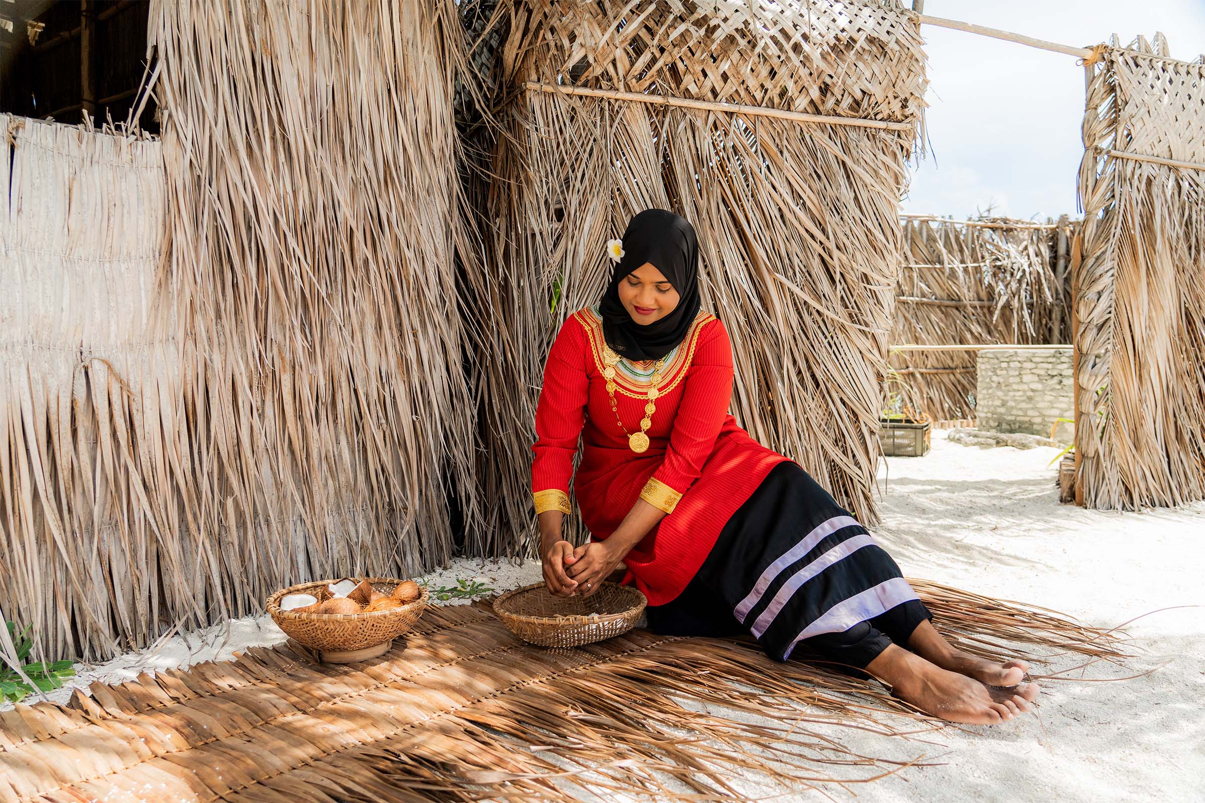 Coconut Husking Sun Siyam Vilu Reef